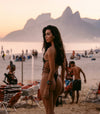 Back view of model wearing Siren open-back one piece swimsuit – Venus Swim